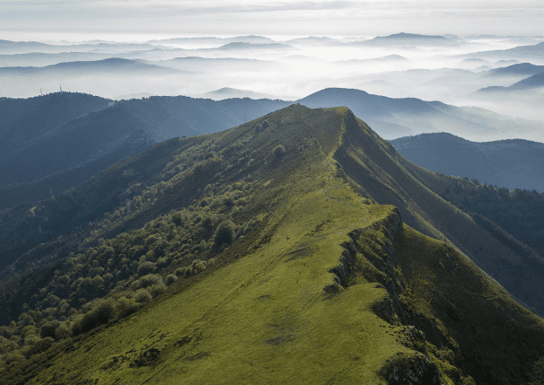 high-angle-shot-beautiful-mountainous-landscape-with-hills-cloudy-sky